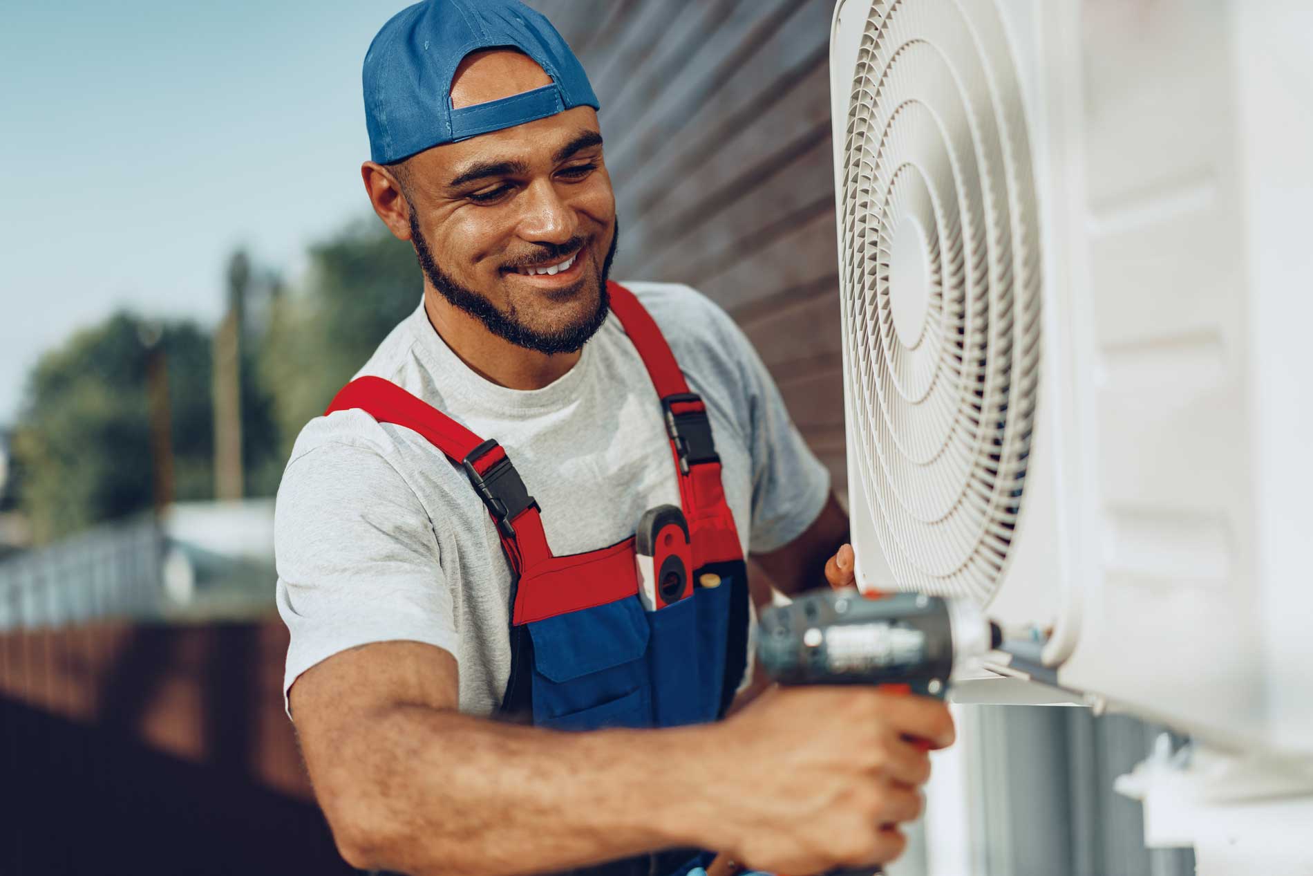 Technician with AC unit